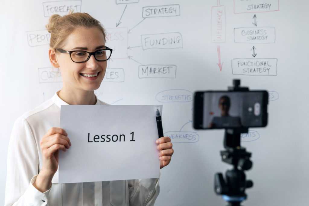 A person recording lesson 1 of a course